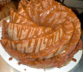 Chocolate pound cake with rich chocolate glaze in a decorative bundt shape